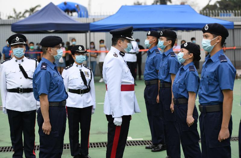 The Civil Aid Service (CAS) held the 81st Recruits Passing-out Parade at its headquarters today (April 25). Photo shows the Acting Deputy Commissioner (Development and Youth) of the CAS, Mr Ng Kwok-fai (fourth left), inspecting the parade.