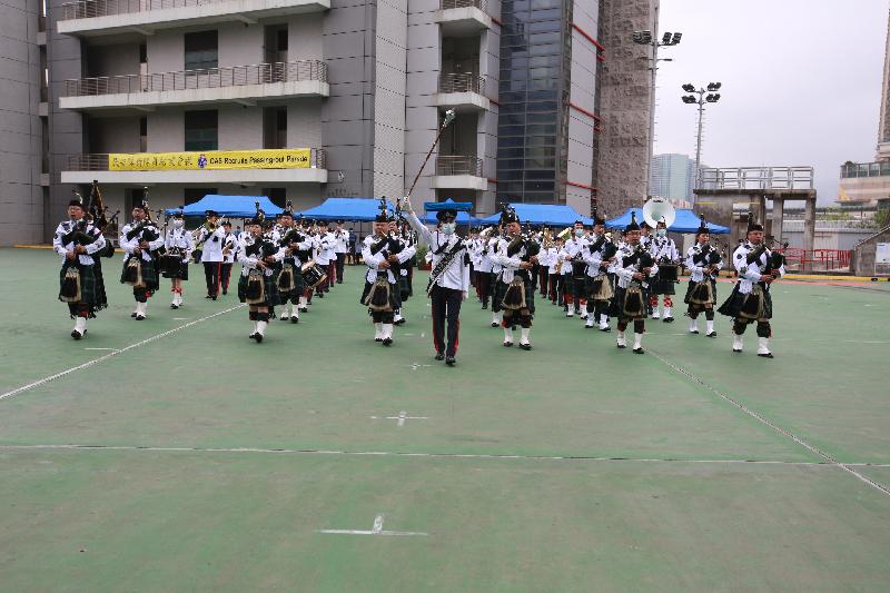 The Civil Aid Service (CAS) held the 81st Recruits Passing-out Parade at its headquarters today (April 25). Photo shows the performance by the CAS Band.