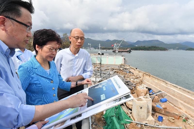 The Chief Executive, Mrs Carrie Lam (centre), accompanied by the Secretary for Environment, Mr Wong Kam-sing (right), and the Director of Drainage Services, Mr Edwin Tong (left), this afternoon (September 24) inspects the Sai Kung Sewage Treatment Works which were seriously damaged by the typhoon.