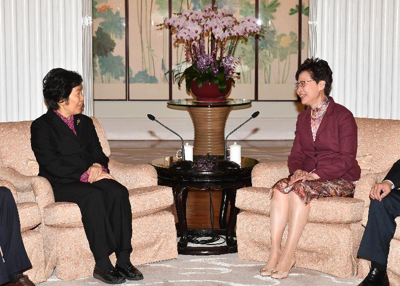 The Chief Executive, Mrs Carrie Lam (right), meets the Auditor General of the National Audit Office, Ms Hu Zejun (left), at Government House this afternoon (March 26).