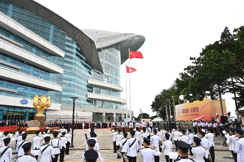 The Chief Executive, Mrs Carrie Lam, together with Principal Officials and guests, attends the flag-raising ceremony for the 71st anniversary of the founding of the People's Republic of China at Golden Bauhinia Square in Wan Chai this morning (October 1). 