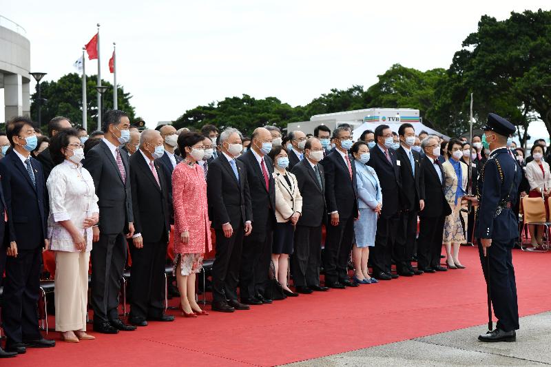 The Chief Executive, Mrs Carrie Lam (front row, fifth left), and her husband Dr Lam Siu-por (front row, sixth left); the Chief Justice of the Court of Final Appeal, Mr Geoffrey Ma Tao-li (front row, seventh left) and his wife, Madam Justice Maria Candace Yuen (front row, eighth left); Vice-Chairman of the National Committee of the Chinese People's Political Consultative Conference (CPPCC) Mr Tung Chee Hwa (front row, fourth left); Vice-Chairman of the National Committee of the CPPCC Mr C Y Leung (front row, third left) and his wife, Mrs Regina Leung (front row, second left); former Chief Executive Mr Donald Tsang (front row, second right) and his wife, Mrs Selina Tsang (front row, first right); the Director of the Liaison Office of the Central People's Government in the Hong Kong Special Administrative Region, Mr Luo Huining (front row, first left); the Chief Secretary for Administration, Mr Matthew Cheung Kin-chung (front row, seventh right); the Financial Secretary, Mr Paul Chan (front row, sixth right); the Secretary for Justice, Ms Teresa Cheng, SC (front row, fifth right); the President of the Legislative Council, Mr Andrew Leung (front row, fourth right); the Convenor of the Non-official Members of the Executive Council, Mr Bernard Chan (front row, third right), together with Principal Officials and guests, attend the flag-raising ceremony for the 71st anniversary of the founding of the People's Republic of China at Golden Bauhinia Square in Wan Chai this morning (October 1).