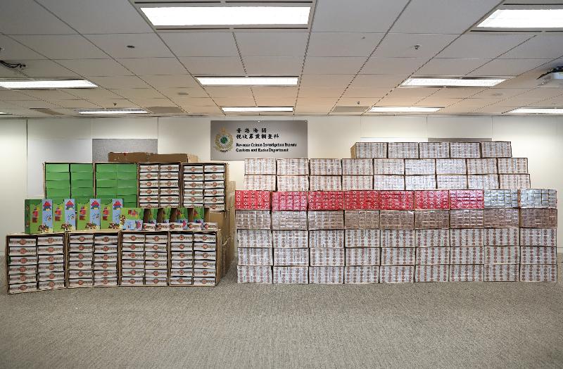 Hong Kong Customs seized a total of about 2 million suspected illicit cigarettes with an estimated market value of about $5.6 million and a duty potential of about $3.9 million in Tsing Yi and Kowloon Bay on March 18 and yesterday (March 24) respectively. Photo shows the suspected illicit cigarettes seized.