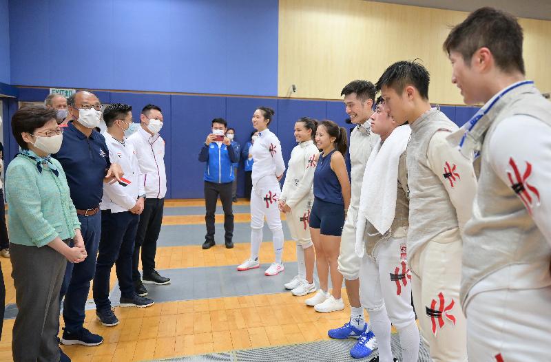 The Chief Executive, Mrs Carrie Lam, this afternoon (May 11) visited the Hong Kong Sports Institute (HKSI) to learn more about the training of the athletes in preparation for the Olympic Games to be held in Tokyo. Photo shows Mrs Lam (first left) chatting with the coach and athletes of the fencing team. Looking on are the Chairman of the Board of Directors of the HKSI, Dr Lam Tai-fai (second left); the Vice-President of the Sports Federation & Olympic Committee of Hong Kong, China, Mr Kenneth Fok (third left) and the Secretary for Home Affairs, Mr Caspar Tsui (fourth left).