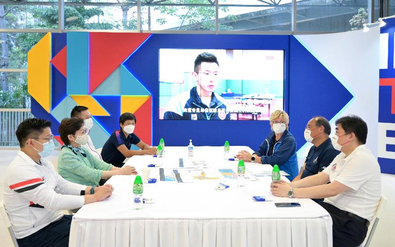 The Chief Executive, Mrs Carrie Lam, this afternoon (May 11) visited the Hong Kong Sports Institute (HKSI) to learn more about the training of the athletes in preparation for the Olympic Games to be held in Tokyo. Photo shows Mrs Lam (second left) being briefed by the Chairman of the Board of Directors of the HKSI, Dr Lam Tai-fai (second right) on the project of the new facilities building of the HKSI.