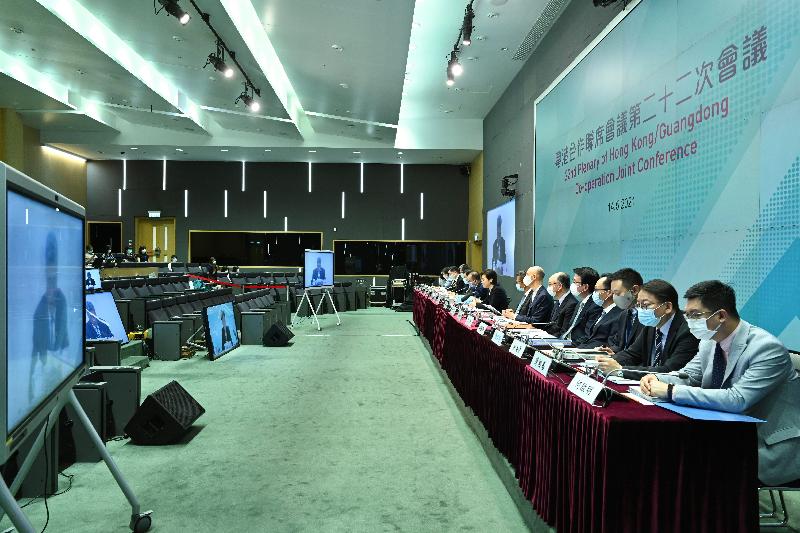The Chief Executive, Mrs Carrie Lam (ninth right), led a Hong Kong Special Administrative Region Government delegation to attend the 22nd Plenary of the Hong Kong/Guangdong Co-operation Joint Conference through video conferencing today (May 14).