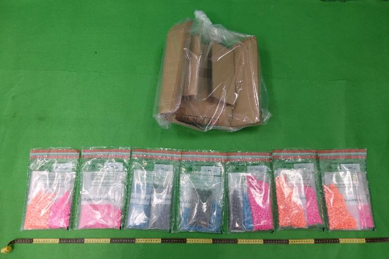 Hong Kong Customs seized about 1.9 kilograms of suspected ecstasy with an estimated market value of about $310,000 at the Hong Kong International Airport on May 8. One woman was arrested yesterday (May 13). Photo shows the carton box and the suspected ecstasy seized.