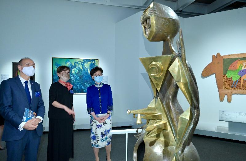 The Chief Executive, Mrs Carrie Lam, attended the opening ceremony of the "Mythologies: Surrealism and Beyond - Masterpieces from Centre Pompidou" exhibition today (May 20). Photo shows Mrs Lam (right) touring the exhibition. Looking on are the Consul General of France in Hong Kong and Macau, Mr Alexandre Giorgini (left) and the Museum Director of Hong Kong Museum of Art, Dr Maria Mok (centre).