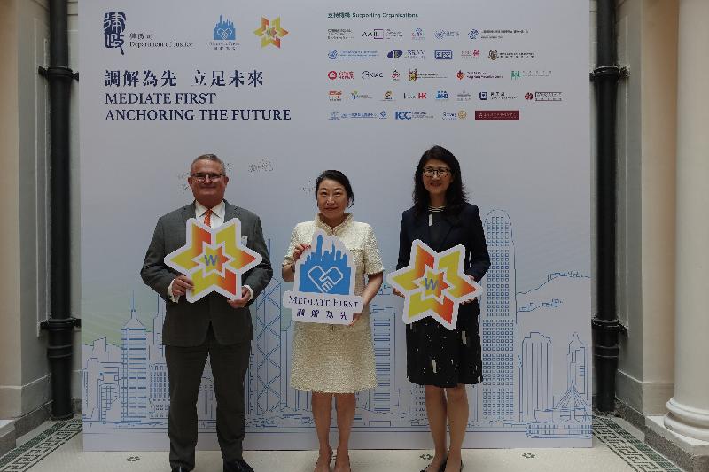 The "Mediate First" Pledge Event 2021 was held online today (May 28) by the Department of Justice to promote the use of mediation in Hong Kong's various sectors for dispute resolution. Photo shows the Secretary for Justice, Ms Teresa Cheng, SC (centre), with the keynote speakers, the President of the Law Society of Hong Kong, Ms Melissa Pang (right), and the Director-General of Investment Promotion, Mr Stephen Phillips (left), at the event.