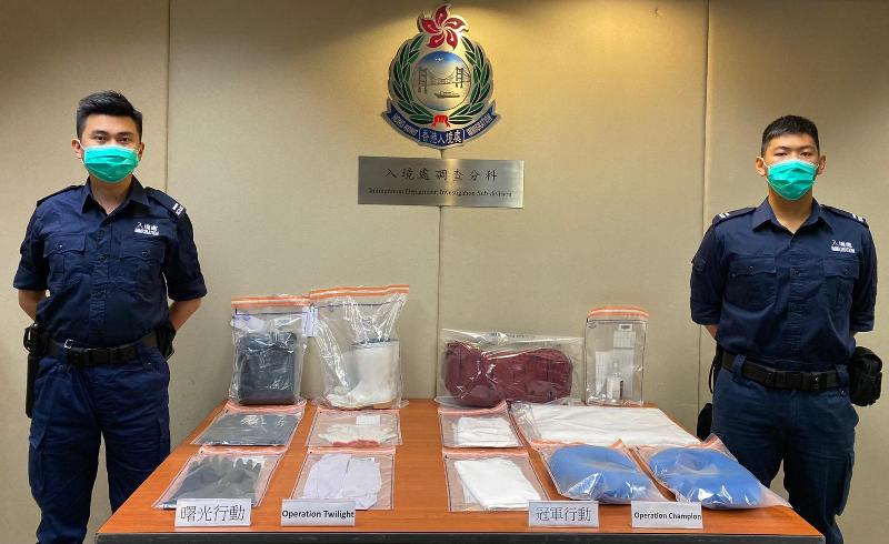 The Immigration Department mounted a series of territory-wide anti-illegal worker operations, including operations codenamed "Twilight" and joint operations with the Hong Kong Police Force codenamed "Champion", from June 7 to 10. Photo shows the items seized during operations "Twilight" and "Champion".