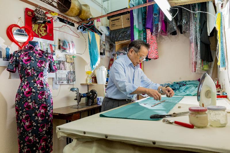 The Hong Kong cheongsam making technique has been inscribed onto the Fifth National List of Intangible Cultural Heritage by the Ministry of Culture and Tourism of the People's Republic of China. Photo shows a cheongsam tailor making a cheongsam meticulously.