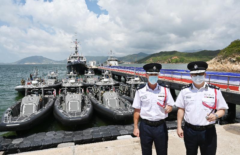 Police Marine Region introduced 11 new vessels during a ceremony held at Joss House Bay, Sai Kung today (June 18). Photo shows the Commissioner of Police, Mr Tang Ping-keung (right) and the Regional Commander of Marine, Mr David Jordan (left) attend the commissioning ceremony.