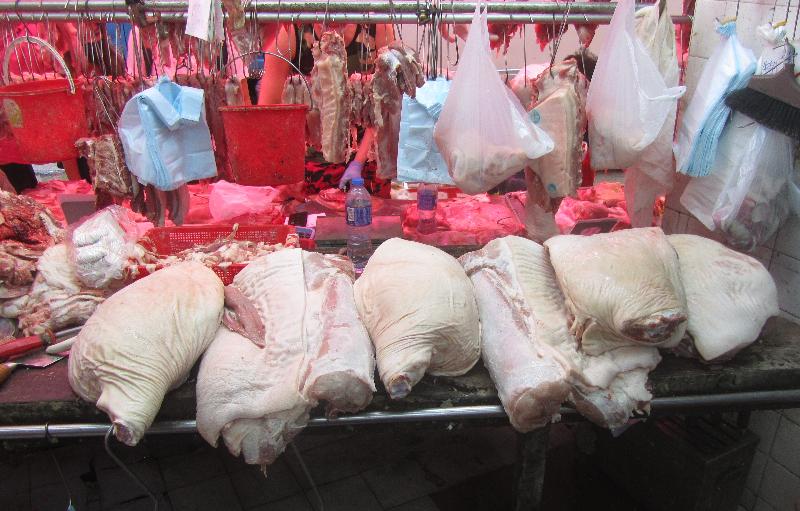 The Food and Environmental Hygiene Department has raided some fresh provision shops in Wan Chai District suspected of selling chilled meat or frozen meat as fresh meat in a blitz operation today (June 30). Photo shows the suspected chilled pork seized.