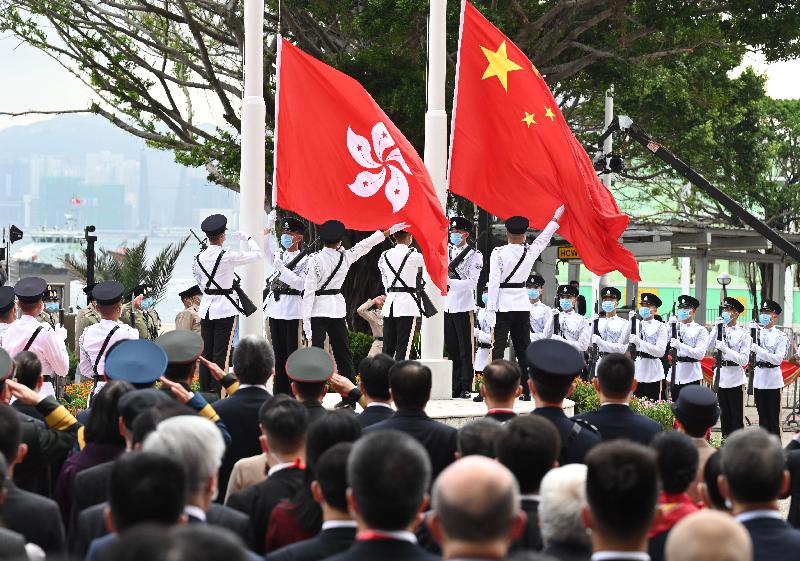The raising of the National and Regional flags at the flag-raising ceremony for the 24th anniversary of the establishment of the Hong Kong Special Administrative Region at Golden Bauhinia Square in Wan Chai this morning (July 1).

