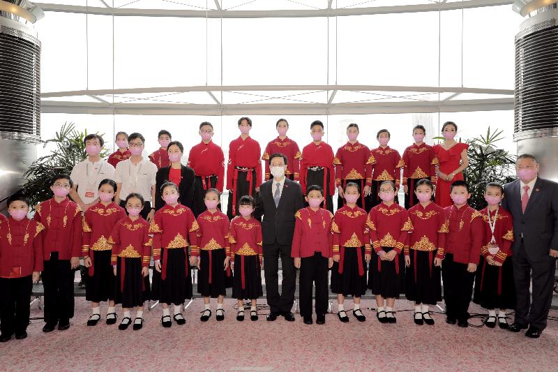 The Acting Chief Executive, Mr John Lee, together with Principal Officials and guests, attended the reception for the 24th anniversary of the establishment of the Hong Kong Special Administrative Region at the Hong Kong Convention and Exhibition Centre this morning (July 1). Photo shows Mr Lee in a group photo with members of the Hong Kong Orchestra of Greater Bay Area Philharmonic who performed in the reception.