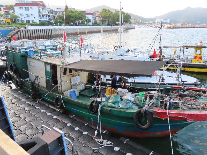 The Agriculture, Fisheries and Conservation Department today (July 4) laid charges against three Mainland fishermen on board a Mainland fishing vessel suspected of engaging in illegal fishing in waters near Basalt Island, Sai Kung. Photo shows the Mainland fishing vessel.
