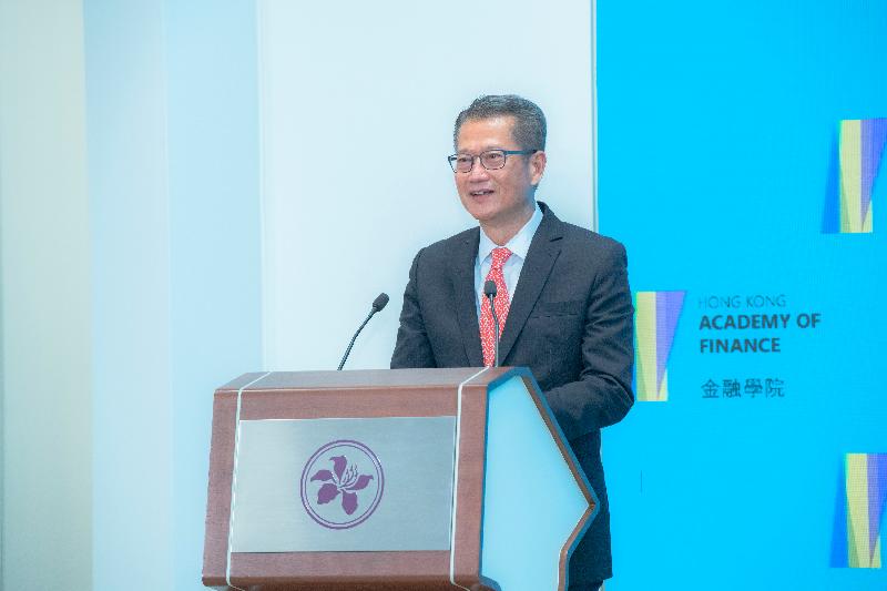 The Financial Secretary and Honorary President of the Hong Kong Academy of Finance (AoF), Mr Paul Chan, delivers opening remarks at the AoF's "Economic Recovery from Covid-19 and Beyond" webinar today (July 6).