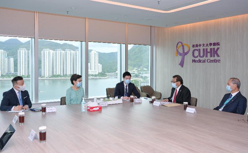 The Chief Executive, Mrs Carrie Lam, today (July 6) visited the Chinese University of Hong Kong (CUHK) Medical Centre in Sha Tin. Photo shows Mrs Lam (second left) being briefed by the Vice-Chancellor and President of the CUHK, Professor Rocky Tuan (second right), on other medical and healthcare development projects of the university.