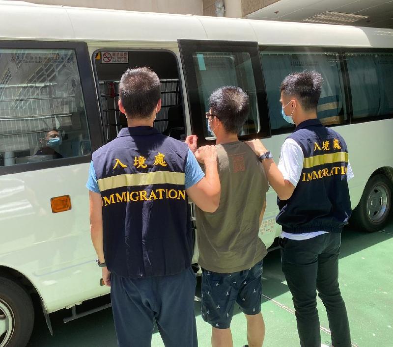 The Immigration Department mounted a series of territory-wide anti-illegal worker operations codenamed "Twilight" from July 12 to 14. Photo shows a suspected illegal worker arrested during the operations.