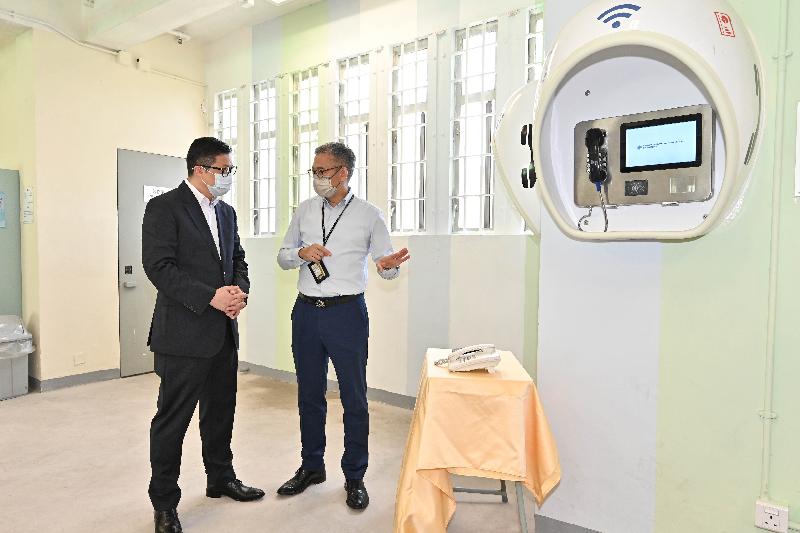 The Secretary for Security, Mr Tang Ping-keung, inspected the Tai Tam Gap Correctional Institution (TGCI) this morning (July 22) to learn more about the application of technology in the first "Smart Prison" of the Correctional Services Department. Photo shows Mr Tang (left) being briefed by the Commissioner of Correctional Services, Mr Woo Ying-ming, on the Integrated Intelligent Communication System provided for people being remanded in the TGCI.