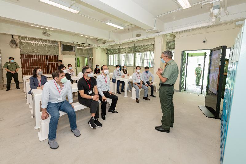The Legislative Council Panel on Security visits the Tai Tam Gap Correctional Institution (TGCI) to better understand the operation and future development of "Smart Prison". Photo shows Members of the Legislative Council listening to a briefing by the Commissioner of Correctional Services, Mr Woo Ying-ming (first right), on how the application of information technology enhances operational efficiency in daily management and security aspects of the TGCI.