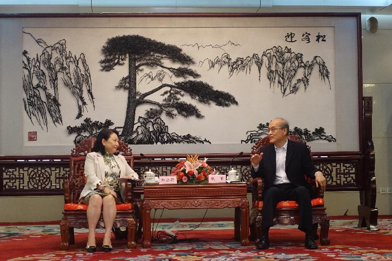 The Secretary for Justice, Ms Teresa Cheng, SC (left), meets with the Procurator-General of the Supreme People's Procuratorate, Mr Zhang Jun (right), in Beijing this afternoon (July 28).