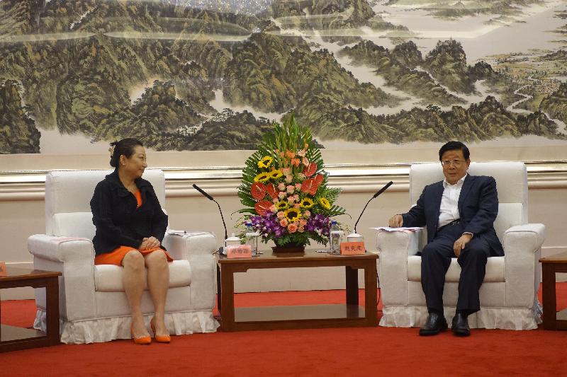 The Secretary for Justice, Ms Teresa Cheng, SC (left), met with the Minister of Public Security, Mr Zhao Kezhi (right), in Beijing this morning (July 29) to give an account of the latest situation in Hong Kong after the National Security Law has taken effect.