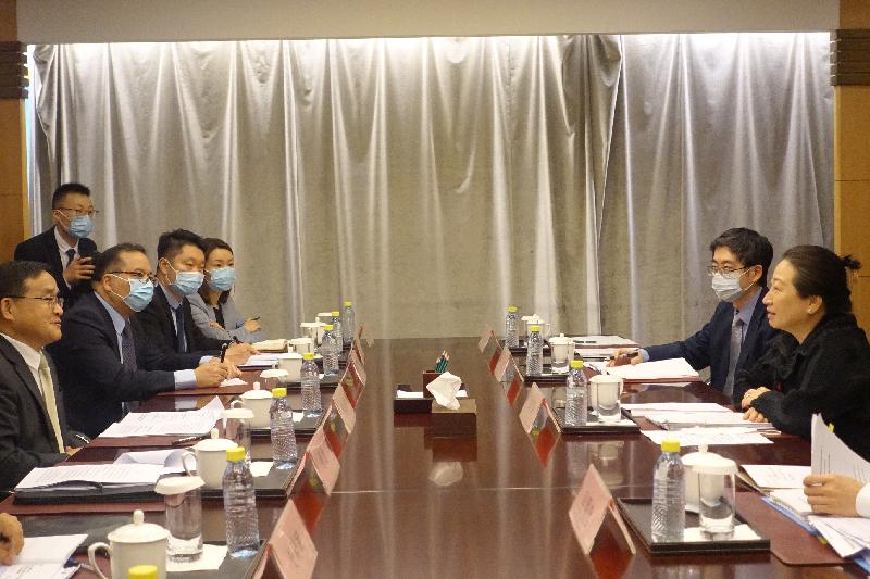 The Secretary for Justice, Ms Teresa Cheng, SC (first right), attends an annual exchange meeting with the Ministry of Foreign Affairs in Beijing this afternoon (July 29) and gives an account of the latest situation in Hong Kong. On the first left is the Director-General of the Department of Treaty and Law, Mr Jia Guide.