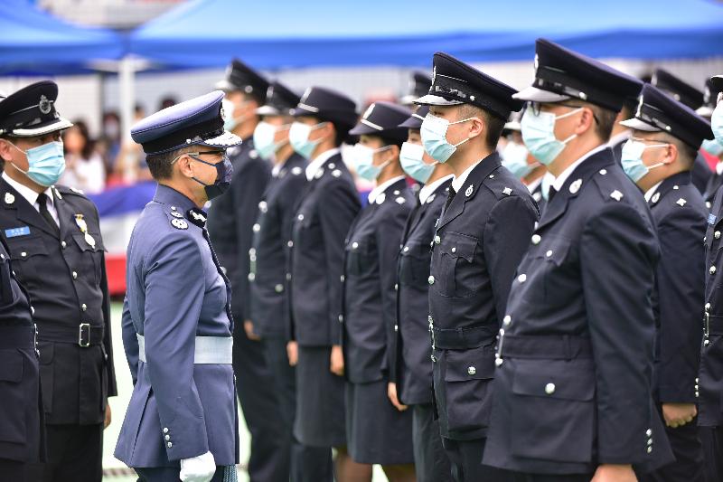 The Civil Aid Service held the 82nd Recruits Passing-out Parade at its headquarters today (August 8). Photo shows the Controller of the Government Flying Service, Captain Wu Wai-hung (second left), inspecting the parade.