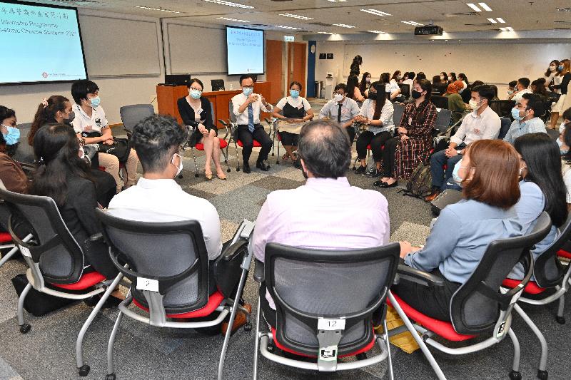 The Secretary for the Civil Service, Mr Patrick Nip, today (August 9) met with non-ethnic Chinese students participating in a government internship programme to learn about their internship experience and takeaways. Photo shows Mr Nip chatting with the interns and encouraging them to fully prepare themselves for future employment.