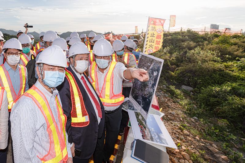 Members of the Legislative Council view the proposed site of the New Territories North New Town from a high point at Kong Nga Po.