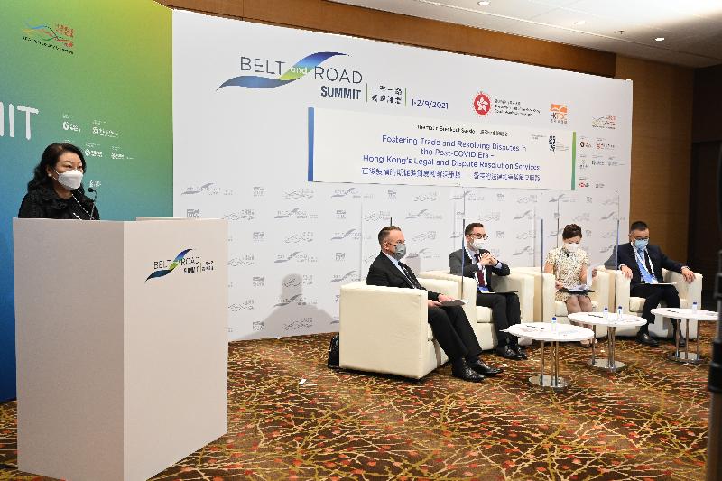The Secretary for Justice, Ms Teresa Cheng, SC (first left), delivers welcome remarks at the sixth Belt and Road Summit's thematic breakout session titled "Fostering Trade and Resolving Disputes in the Post-COVID Era - Hong Kong's Legal and Dispute Resolution Services" today (September 1). Looking on are (from second left) the Panel Chair, Mr Paul Starr, and speakers Mr Simon Chapman, Ms Joelle Lau and Dr Thomas So.
 
