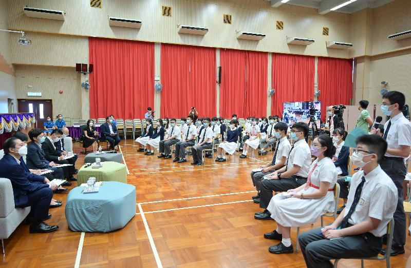 The Chief Executive, Mrs Carrie Lam, today (September 3) visited Po Leung Kuk Lo Kit Sing (1983) College in Tsing Yi. Photo shows Mrs Lam (third left) listening to views and suggestions of students on the upcoming Policy Address.


