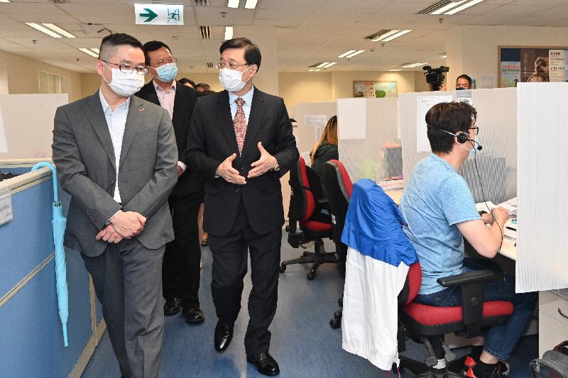 The Chief Secretary for Administration, Mr John Lee, today (September 14) visited the Registration and Electoral Office (REO) in Kowloon Bay to inspect and be briefed on the arrangements and preparation for the 2021 Election Committee Subsector Ordinary Elections to be held on Sunday (September 19). Photo shows Mr Lee (third left), accompanied by the Chief Electoral Officer of the REO, Mr Alan Yung (second left), visiting the call centre and receiving a briefing from REO staff members on various aspects of preparatory work for the Elections.