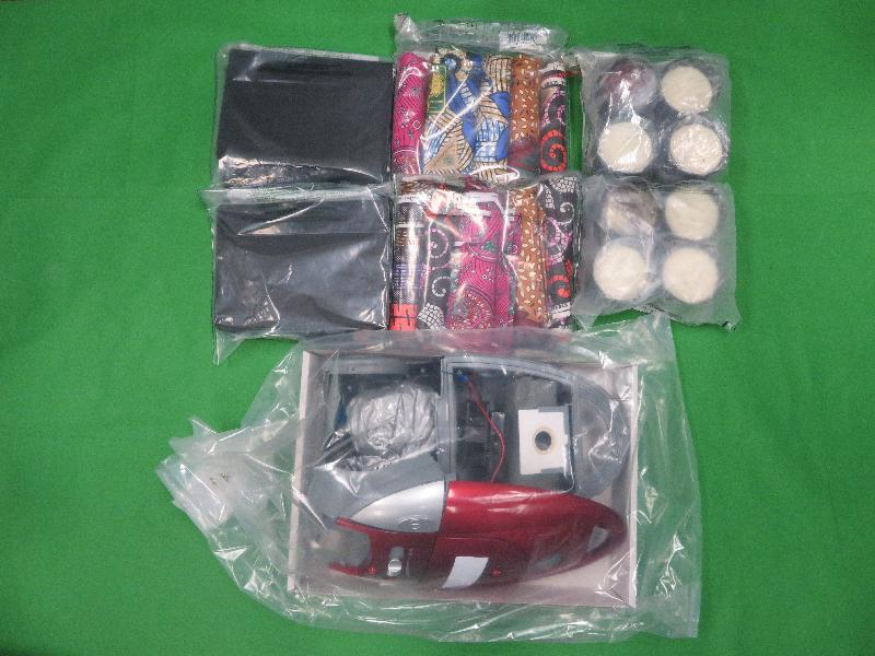 Hong Kong Customs conducted a large-scale anti-narcotics operation between September 1 and today (September 15) with a view to combating drug trafficking syndicates smuggling drugs into Hong Kong through parcels. Photo shows some of the goods used to conceal the suspected drugs, including candles and a vacuum cleaner.