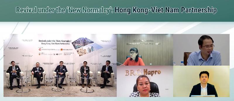 The Commerce and Economic Development Bureau and the Ministry of Industry and Trade of the Socialist Republic of Vietnam jointly held a webinar titled "Revival under the 'New Normalcy': Hong Kong - Viet Nam Partnership" today (September 20) to explore collaboration opportunities in such fields as trade, investment, professional services as well as innovation and technology. Photo shows the Secretary for Commerce and Economic Development, Mr Edward Yau (fifth left), and the Commissioner for Belt and Road, Dr Denis Yip (first left), responding to participants' questions with panellists of the two places at the discussion session.