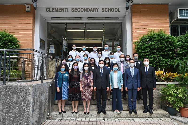 The Chief Secretary for Administration, Mr John Lee, today (October 4) visited Clementi Secondary School. Photo shows Mr Lee (front row, centre); the Under Secretary for Education, Dr Choi Yuk-lin (front row, third right); and the Principal of Clementi Secondary School, Mrs Bonnie Fung (front row, third left), with staff and students.