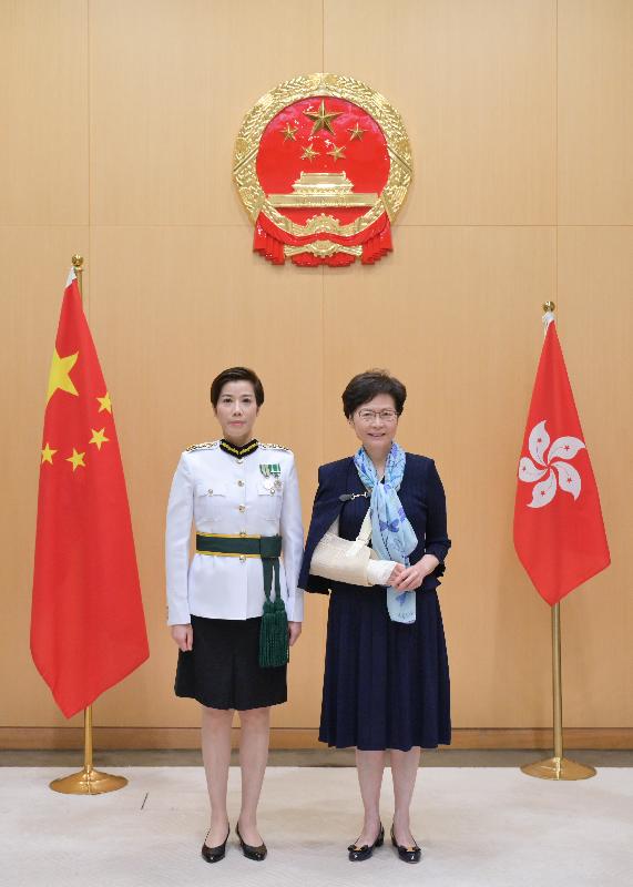 The Chief Executive, Mrs Carrie Lam (right), is pictured with the new Commissioner of Customs and Excise, Ms Louise Ho (left), today (October 21).
