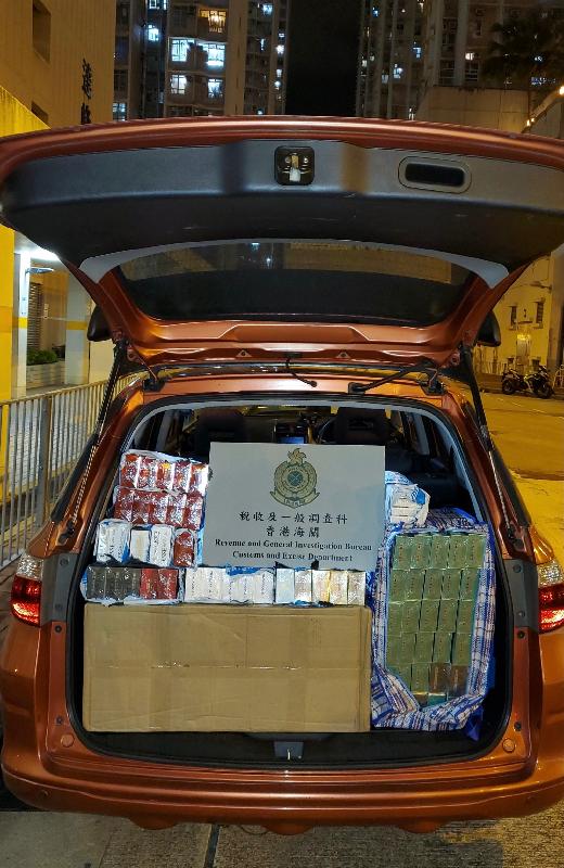 Hong Kong Customs has mounted an enforcement operation codenamed "Thunder V" in the past three weeks to combat illicit cigarette telephone-ordering activities in public rental housing. A total of about 1.4 million suspected illicit cigarettes with an estimated market value of about $3.8 million and a duty potential of about $2.6 million were seized across the territory. Photo shows one of the vehicles suspected of being used for illicit cigarette distribution.