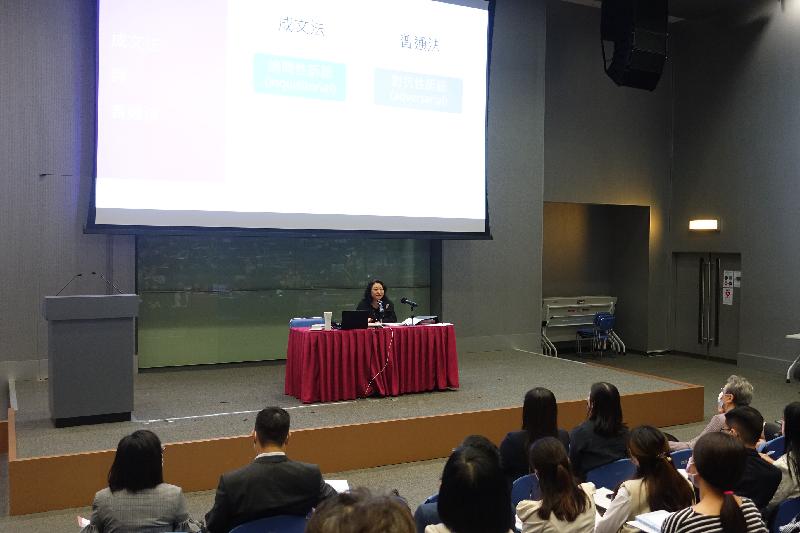 The Secretary for Justice, Ms Teresa Cheng, SC, speaks with teachers on the proper concepts of the rule of law and the legal system in Hong Kong at a training course, "Reinforcing the Rule of Law", today (October 21).