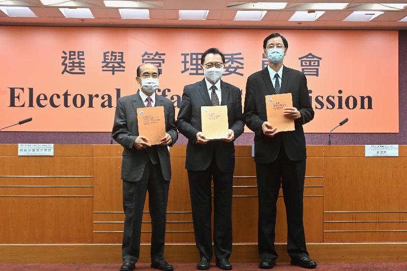 The Chairman of the Electoral Affairs Commission (EAC), Mr Justice Barnabas Fung Wah (centre), and EAC members Mr Arthur Luk, SC (left), and Professor Daniel Shek (right) present the Guidelines on Election-related Activities in respect of the Legislative Council Election at a press conference today (October 25).