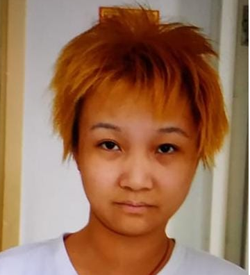 Man Wai-fan, aged 33, is about 1.65 metres tall, 45 kilograms in weight and of thin build. She has a long face with yellow complexion and short blond hair. She was last seen wearing a white short-sleeved T-shirt, black trousers, white sport shoes and carrying an army green backpack.