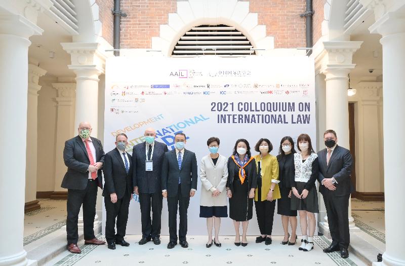 The Chief Executive, Mrs Carrie Lam, attended the 2021 Colloquium on International Law today (November 19). Photo shows Mrs Lam (fifth left); the Commissioner of the Ministry of Foreign Affairs of the People's Republic of China in the Hong Kong Special Administrative Region, Mr Liu Guangyuan (fourth left); the Chairman of the Asian Academy of International Law, Dr Anthony Neoh (third left); the Secretary for Justice, Ms Teresa Cheng, SC (fifth right); and other guests at the Colloquium.