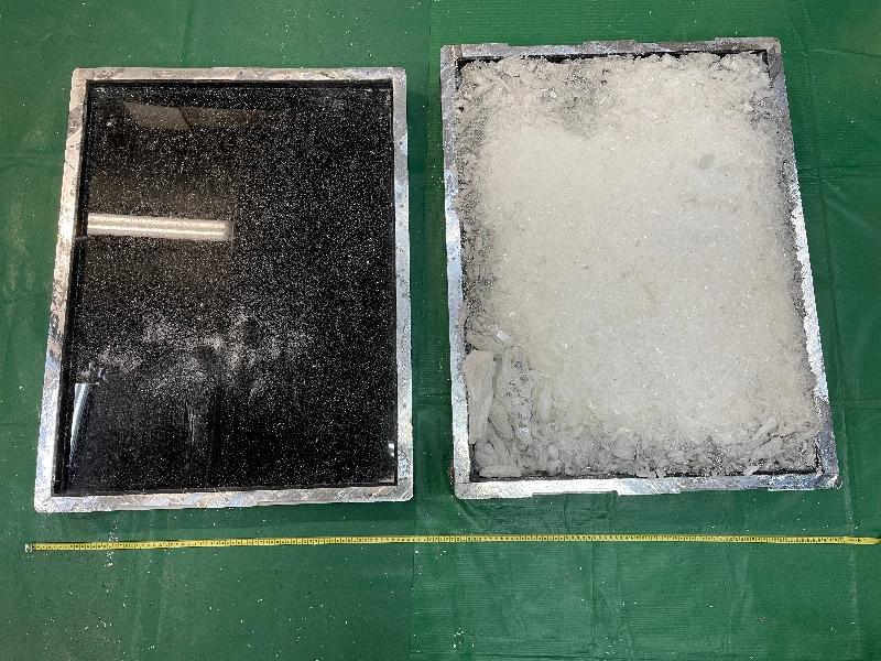 Hong Kong Customs seized about 145 kilograms of suspected cocaine and about 20kg of suspected methamphetamine with a total estimated market value of about $164 million at Hong Kong International Airport on November 18 and 19. Photo shows a metal device with suspected methamphetamine concealed inside the false compartment.