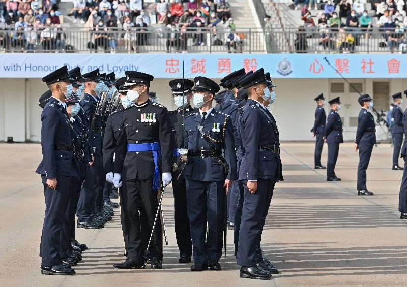 The Commissioner of Police, Mr Siu Chak-yee, inspects a passing-out parade as a reviewing officer at the Hong Kong Police College today (November 27).
