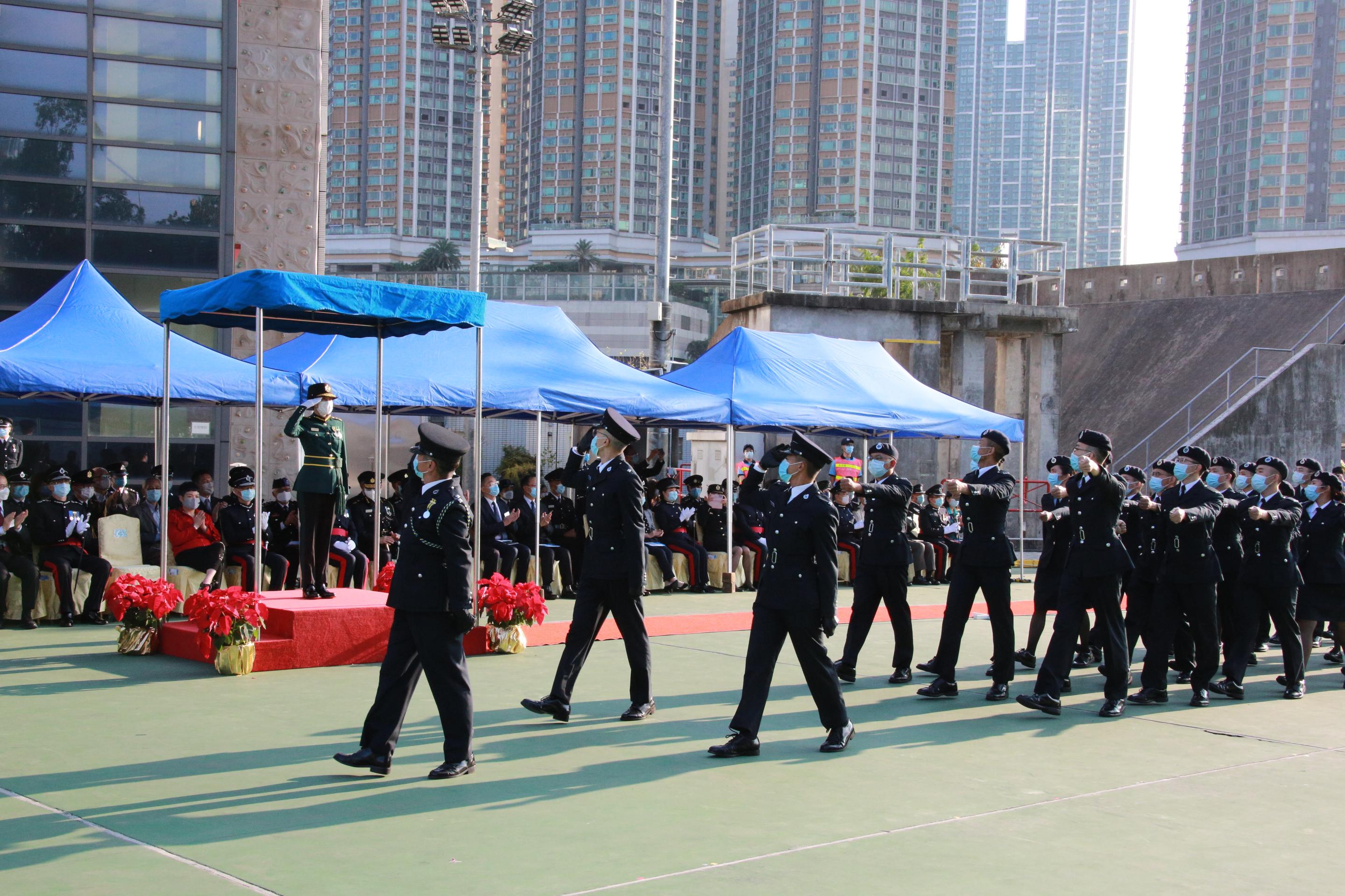 The Civil Aid Service held the 83rd Recruits Passing-out Parade at its headquarters today (December 12).  Photo shows the parade marching past the review stand.