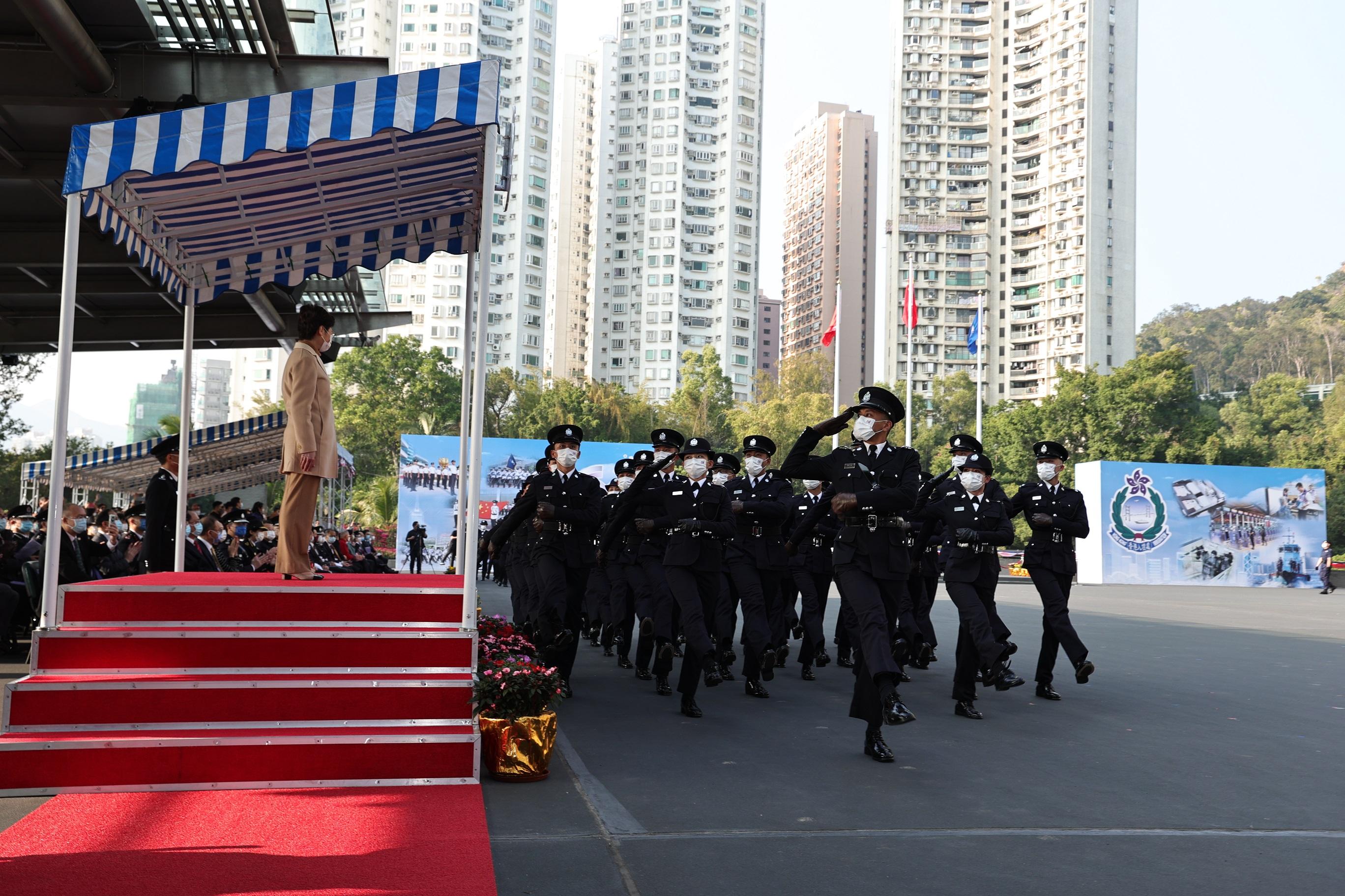The Immigration Department Passing-out Parade cum 60th Anniversary Grand Parade was held today (December 30). Photo shows passing-out officers marching past the dais in “goose-steps”, a Chinese-style foot drill.