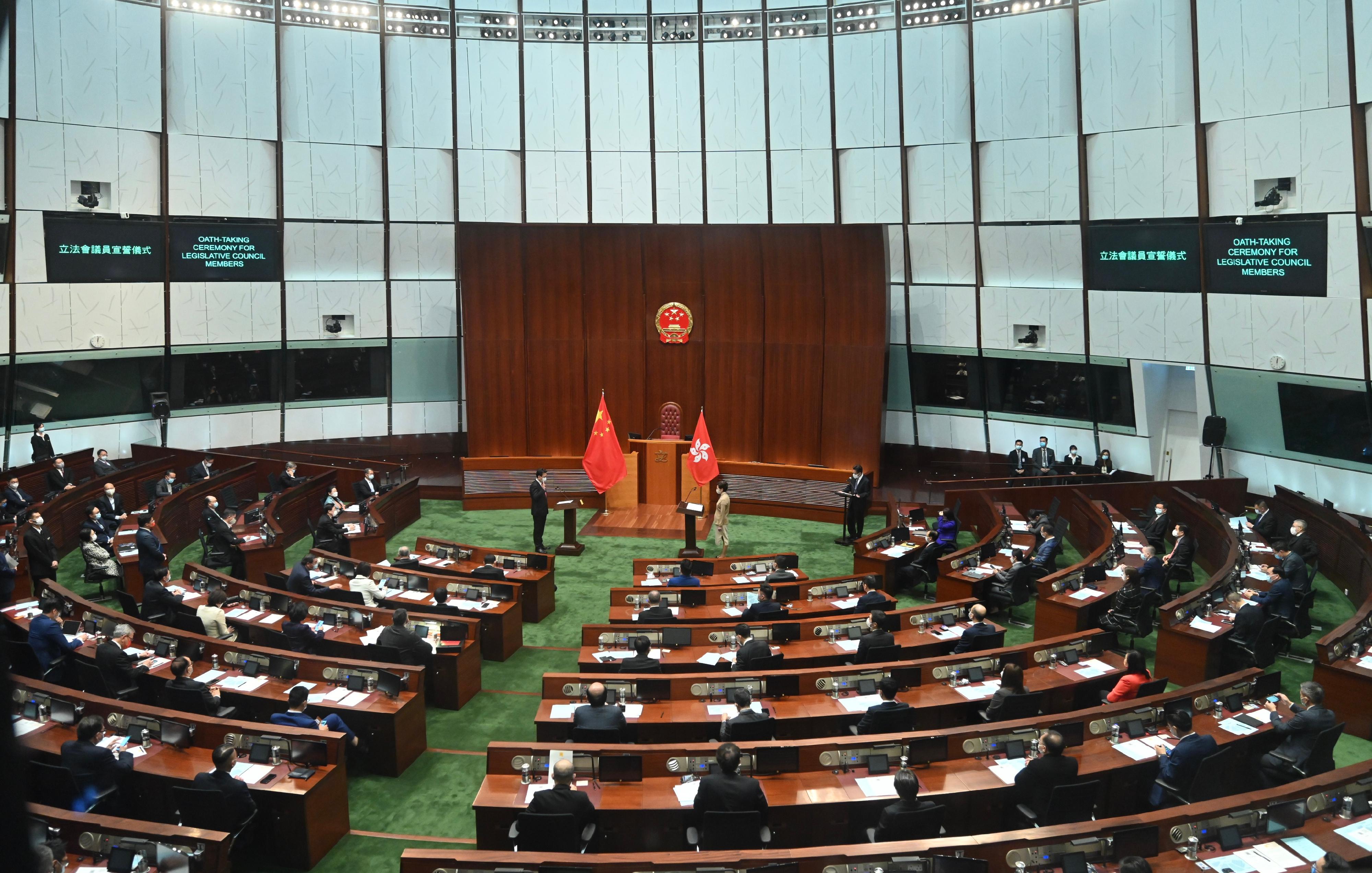 The Chief Executive, Mrs Carrie Lam, administers the oath-taking of members of the seventh-term Legislative Council (LegCo) at the Chamber of the LegCo Complex today (January 3).