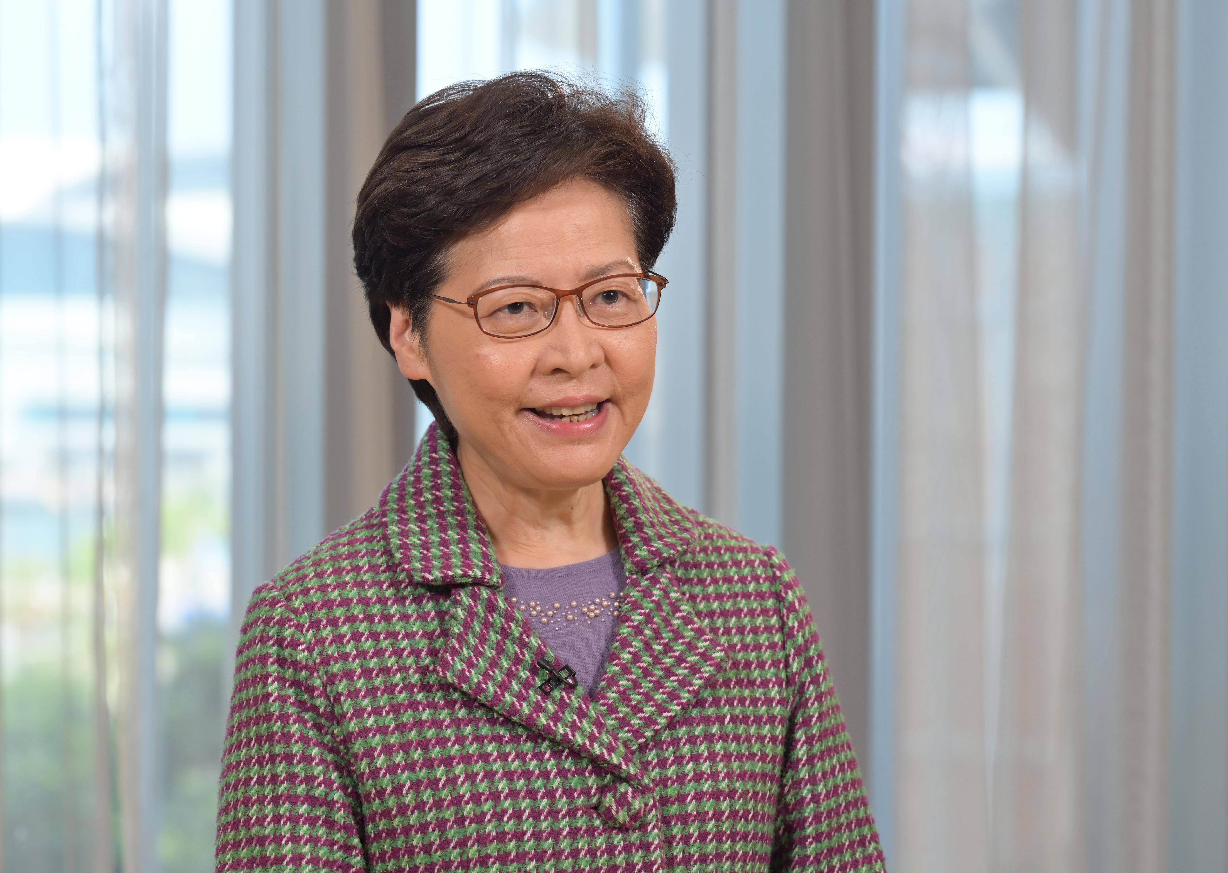 The Chief Executive, Mrs Carrie Lam, delivers a video speech at the 15th Asian Financial Forum held online today (January 10).