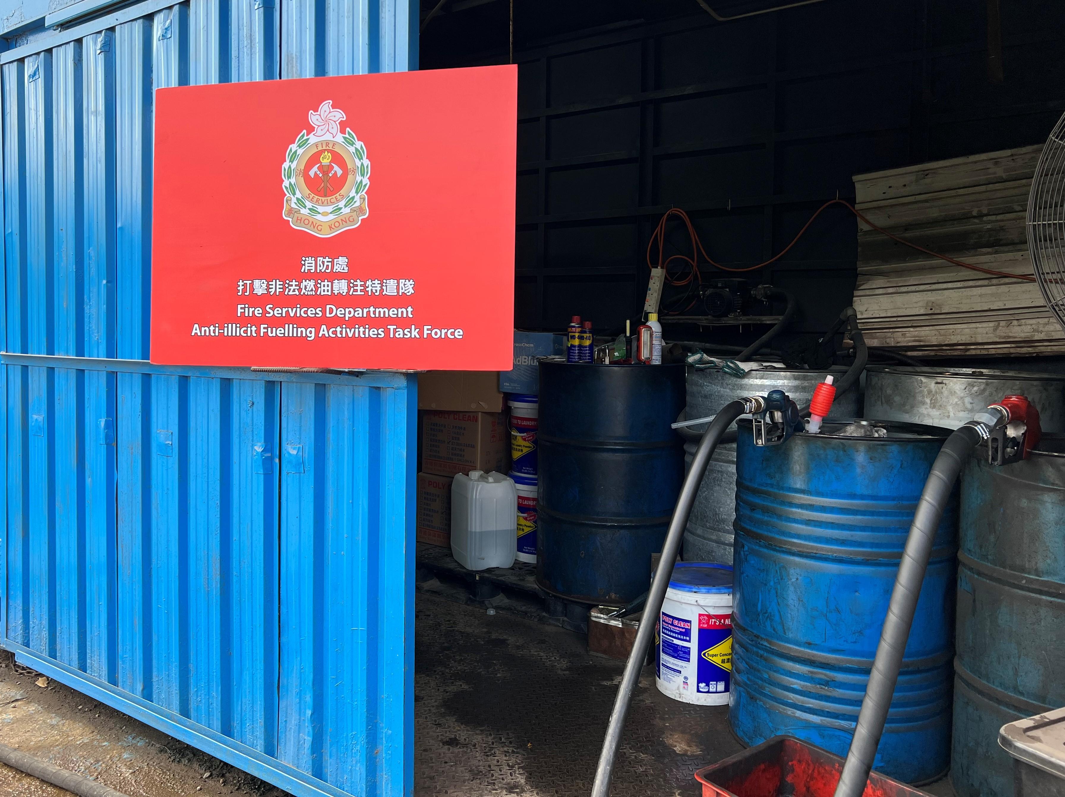 The Fire Services Department, the Hong Kong Police Force and Hong Kong Customs mounted a joint operation codenamed "Winter Thunder" to combat illicit fuelling activities today (January 26). Photo shows metal drums and fuelling facilities at a suspected illegal fuelling station.